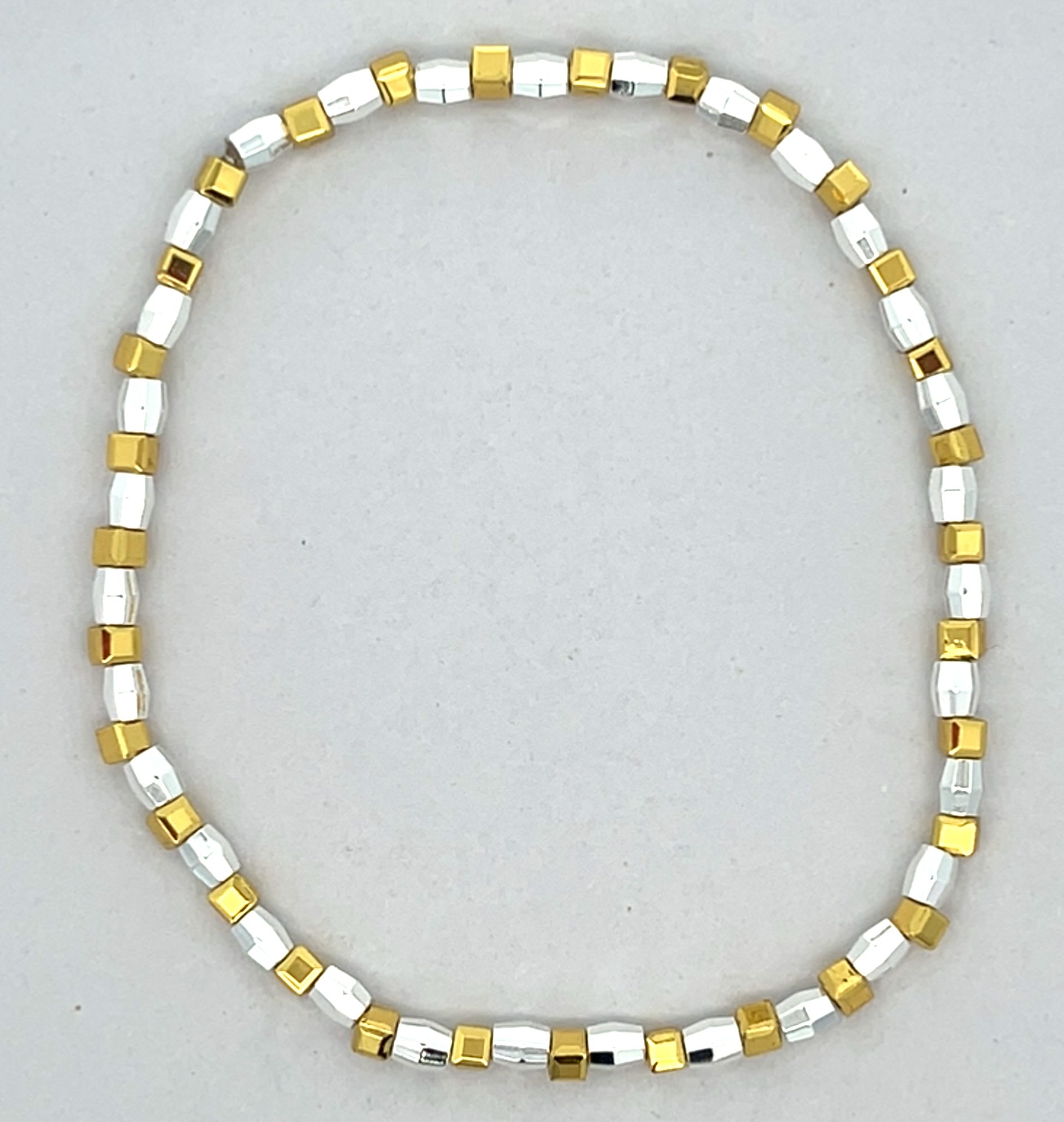 LIGHT YELLOW AND SILVER BEADED STRETCH BRACELET