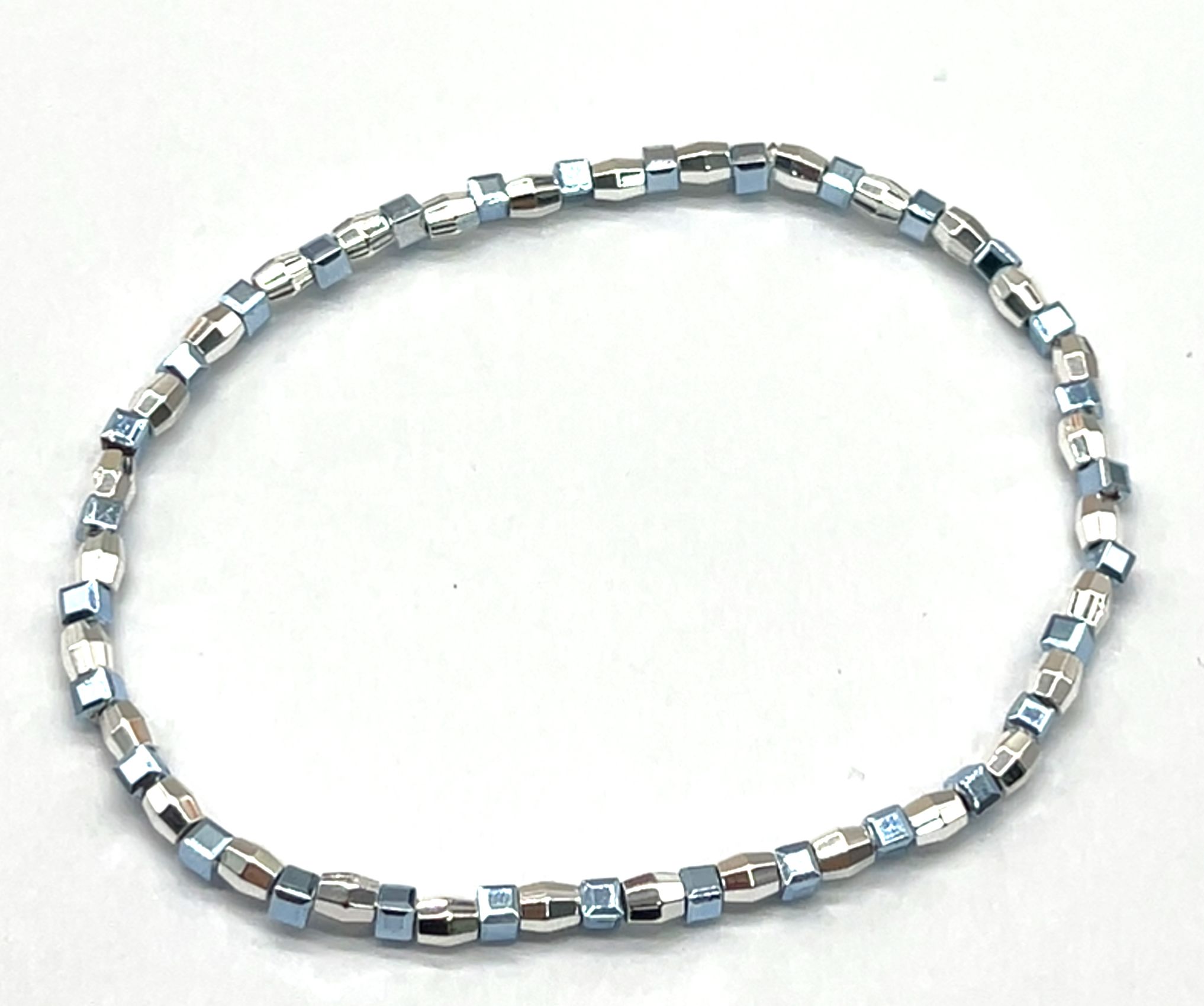 LIGHT BLUE AND SILVER BEADED STRETCH BRACELET